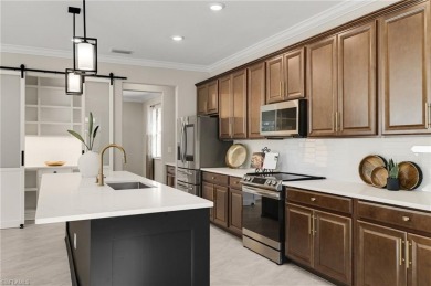 Discover refined luxury within the contemporary ambiance of this on Old Corkscrew Golf Club in Florida - for sale on GolfHomes.com, golf home, golf lot