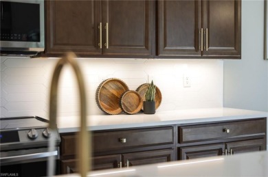 Discover refined luxury within the contemporary ambiance of this on Old Corkscrew Golf Club in Florida - for sale on GolfHomes.com, golf home, golf lot