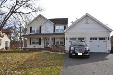 Welcome to this charming 4-bedroom colonial nestled on Tee 6 of on Ocean Acres Country Club in New Jersey - for sale on GolfHomes.com, golf home, golf lot