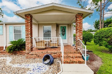 This gorgeous home lives larger than the stated square footage on Pine Lakes Country Club in Florida - for sale on GolfHomes.com, golf home, golf lot