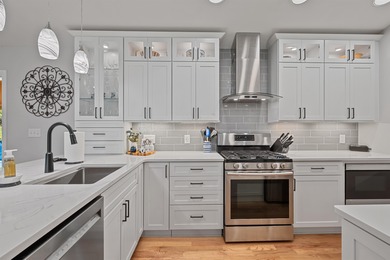 Nestled in the sought after gated waterfront community of South on Laconia Country Club in New Hampshire - for sale on GolfHomes.com, golf home, golf lot