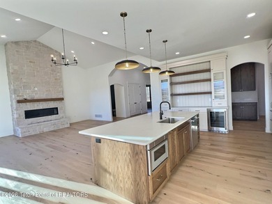 This home perfectly blends luxury with practicality. It offers a on Teton Reserve in Idaho - for sale on GolfHomes.com, golf home, golf lot