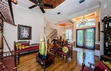 Welcome to this beautifully appointed 5-bedroom, 4-bathroom on Wentworth Golf Club in Florida - for sale on GolfHomes.com, golf home, golf lot