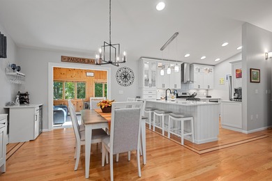 Nestled in the sought after gated waterfront community of South on Laconia Country Club in New Hampshire - for sale on GolfHomes.com, golf home, golf lot