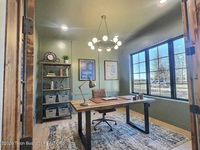 This home perfectly blends luxury with practicality. It offers a on Teton Reserve in Idaho - for sale on GolfHomes.com, golf home, golf lot