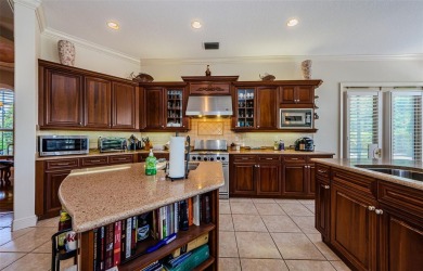 Welcome to this beautifully appointed 5-bedroom, 4-bathroom on Wentworth Golf Club in Florida - for sale on GolfHomes.com, golf home, golf lot