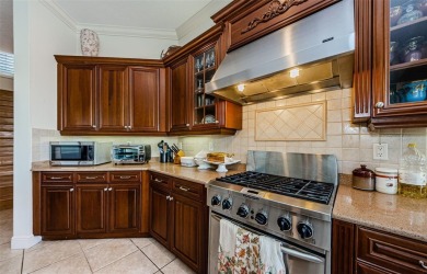 Welcome to this beautifully appointed 5-bedroom, 4-bathroom on Wentworth Golf Club in Florida - for sale on GolfHomes.com, golf home, golf lot