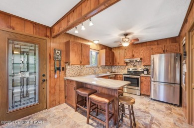 Nestled in the heart of the serene Lake Naomi community, this on Lake Naomi Timber Trails Golf Club in Pennsylvania - for sale on GolfHomes.com, golf home, golf lot