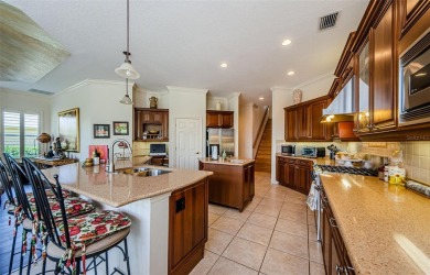 Welcome to this beautifully appointed 5-bedroom, 4-bathroom on Wentworth Golf Club in Florida - for sale on GolfHomes.com, golf home, golf lot