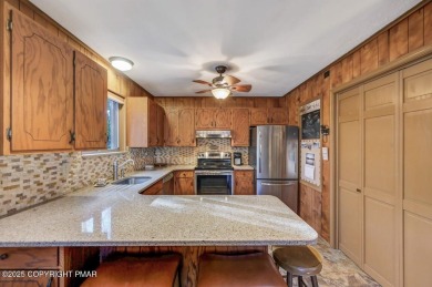 Nestled in the heart of the serene Lake Naomi community, this on Lake Naomi Timber Trails Golf Club in Pennsylvania - for sale on GolfHomes.com, golf home, golf lot