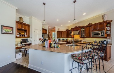 Welcome to this beautifully appointed 5-bedroom, 4-bathroom on Wentworth Golf Club in Florida - for sale on GolfHomes.com, golf home, golf lot