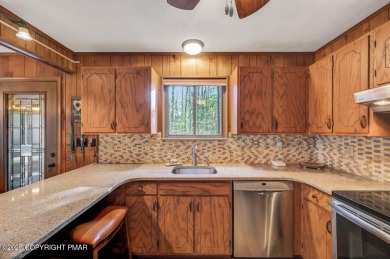 Nestled in the heart of the serene Lake Naomi community, this on Lake Naomi Timber Trails Golf Club in Pennsylvania - for sale on GolfHomes.com, golf home, golf lot
