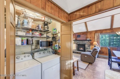 Nestled in the heart of the serene Lake Naomi community, this on Lake Naomi Timber Trails Golf Club in Pennsylvania - for sale on GolfHomes.com, golf home, golf lot
