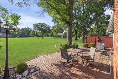Welcome to this inviting ranch-style, single-level townhome with on Leawood South Country Club in Kansas - for sale on GolfHomes.com, golf home, golf lot