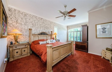 Welcome to this beautifully appointed 5-bedroom, 4-bathroom on Wentworth Golf Club in Florida - for sale on GolfHomes.com, golf home, golf lot