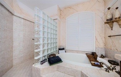Welcome to this beautifully appointed 5-bedroom, 4-bathroom on Wentworth Golf Club in Florida - for sale on GolfHomes.com, golf home, golf lot