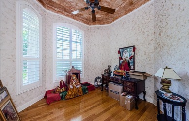 Welcome to this beautifully appointed 5-bedroom, 4-bathroom on Wentworth Golf Club in Florida - for sale on GolfHomes.com, golf home, golf lot