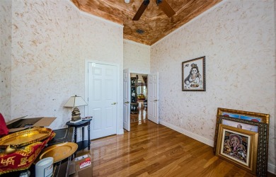 Welcome to this beautifully appointed 5-bedroom, 4-bathroom on Wentworth Golf Club in Florida - for sale on GolfHomes.com, golf home, golf lot