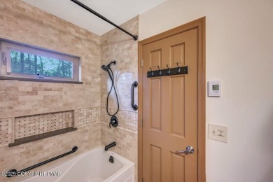 Nestled in the heart of the serene Lake Naomi community, this on Lake Naomi Timber Trails Golf Club in Pennsylvania - for sale on GolfHomes.com, golf home, golf lot