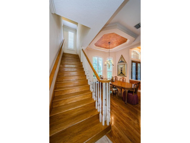 Welcome to this beautifully appointed 5-bedroom, 4-bathroom on Wentworth Golf Club in Florida - for sale on GolfHomes.com, golf home, golf lot