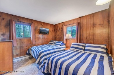 Nestled in the heart of the serene Lake Naomi community, this on Lake Naomi Timber Trails Golf Club in Pennsylvania - for sale on GolfHomes.com, golf home, golf lot