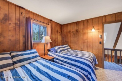Nestled in the heart of the serene Lake Naomi community, this on Lake Naomi Timber Trails Golf Club in Pennsylvania - for sale on GolfHomes.com, golf home, golf lot