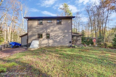 Nestled in the heart of the serene Lake Naomi community, this on Lake Naomi Timber Trails Golf Club in Pennsylvania - for sale on GolfHomes.com, golf home, golf lot