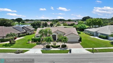 Welcome to your dream home in beautiful Boca Woods Country Club! on Boca Woods Country Club in Florida - for sale on GolfHomes.com, golf home, golf lot