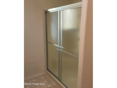 Fabulous home at a fabulous price! Long time owners have taken on Quail Wood Greens Golf Course in Arizona - for sale on GolfHomes.com, golf home, golf lot