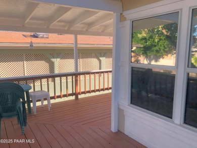 Fabulous home at a fabulous price! Long time owners have taken on Quail Wood Greens Golf Course in Arizona - for sale on GolfHomes.com, golf home, golf lot