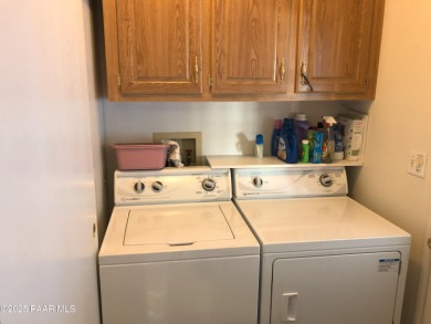 Fabulous home at a fabulous price! Long time owners have taken on Quail Wood Greens Golf Course in Arizona - for sale on GolfHomes.com, golf home, golf lot