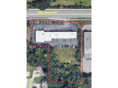 Great opportunity for a fully leased automotive retail Grand on Indian Trails Golf Course in Michigan - for sale on GolfHomes.com, golf home, golf lot