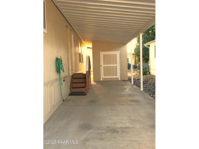 Fabulous home at a fabulous price! Long time owners have taken on Quail Wood Greens Golf Course in Arizona - for sale on GolfHomes.com, golf home, golf lot