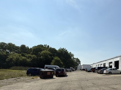 Great opportunity for a fully leased automotive retail Grand on Indian Trails Golf Course in Michigan - for sale on GolfHomes.com, golf home, golf lot