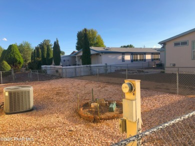 Fabulous home at a fabulous price! Long time owners have taken on Quail Wood Greens Golf Course in Arizona - for sale on GolfHomes.com, golf home, golf lot
