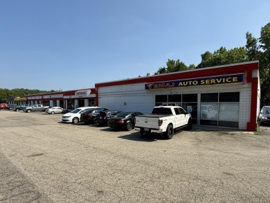 Great opportunity for a fully leased automotive retail Grand on Indian Trails Golf Course in Michigan - for sale on GolfHomes.com, golf home, golf lot