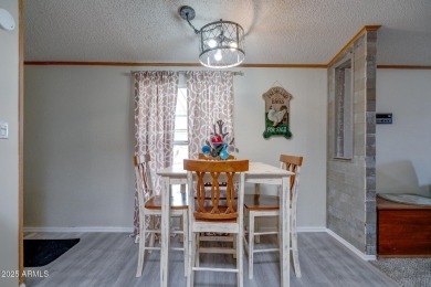 Welcome home to lively resort-style living at La Casa Blanca, a on Apache Creek Golf Club in Arizona - for sale on GolfHomes.com, golf home, golf lot