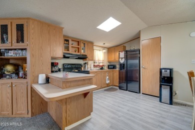 Welcome home to lively resort-style living at La Casa Blanca, a on Apache Creek Golf Club in Arizona - for sale on GolfHomes.com, golf home, golf lot
