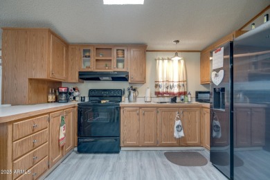 Welcome home to lively resort-style living at La Casa Blanca, a on Apache Creek Golf Club in Arizona - for sale on GolfHomes.com, golf home, golf lot