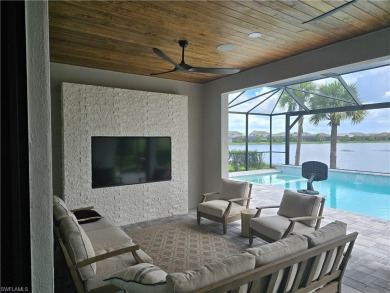 Offered below appraisal value, this residence in Grey Hawk on Golf Club of the Everglades in Florida - for sale on GolfHomes.com, golf home, golf lot