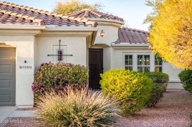 This picturesque 2-bedroom, 2-bathroom + large den residence on Corte Bella Golf Club in Arizona - for sale on GolfHomes.com, golf home, golf lot