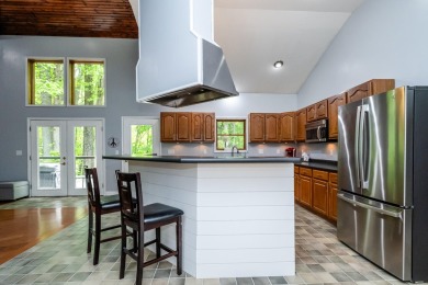 Nestled in a quiet cul-de-sac, this beautifully updated on Point O Woods Country Club in Michigan - for sale on GolfHomes.com, golf home, golf lot