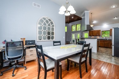 Nestled in a quiet cul-de-sac, this beautifully updated on Point O Woods Country Club in Michigan - for sale on GolfHomes.com, golf home, golf lot