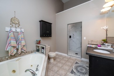 Nestled in a quiet cul-de-sac, this beautifully updated on Point O Woods Country Club in Michigan - for sale on GolfHomes.com, golf home, golf lot