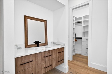 On a premier golf course lot in The Dunes, this exquisite on The Dunes Golf and Tennis Club in Florida - for sale on GolfHomes.com, golf home, golf lot