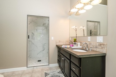 Nestled in a quiet cul-de-sac, this beautifully updated on Point O Woods Country Club in Michigan - for sale on GolfHomes.com, golf home, golf lot