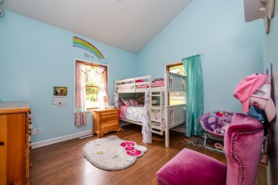 Nestled in a quiet cul-de-sac, this beautifully updated on Point O Woods Country Club in Michigan - for sale on GolfHomes.com, golf home, golf lot