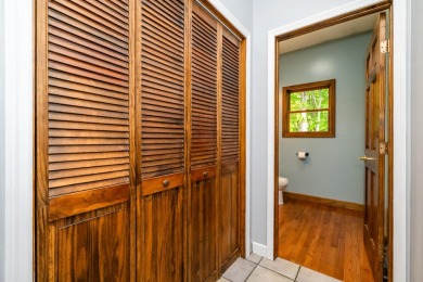 Nestled in a quiet cul-de-sac, this beautifully updated on Point O Woods Country Club in Michigan - for sale on GolfHomes.com, golf home, golf lot