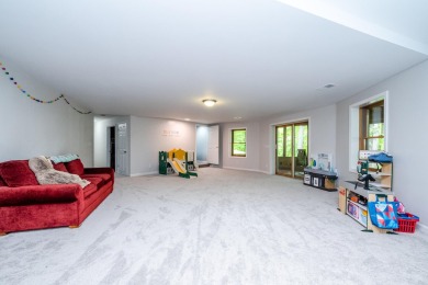 Nestled in a quiet cul-de-sac, this beautifully updated on Point O Woods Country Club in Michigan - for sale on GolfHomes.com, golf home, golf lot