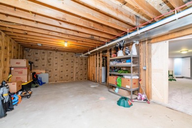Nestled in a quiet cul-de-sac, this beautifully updated on Point O Woods Country Club in Michigan - for sale on GolfHomes.com, golf home, golf lot